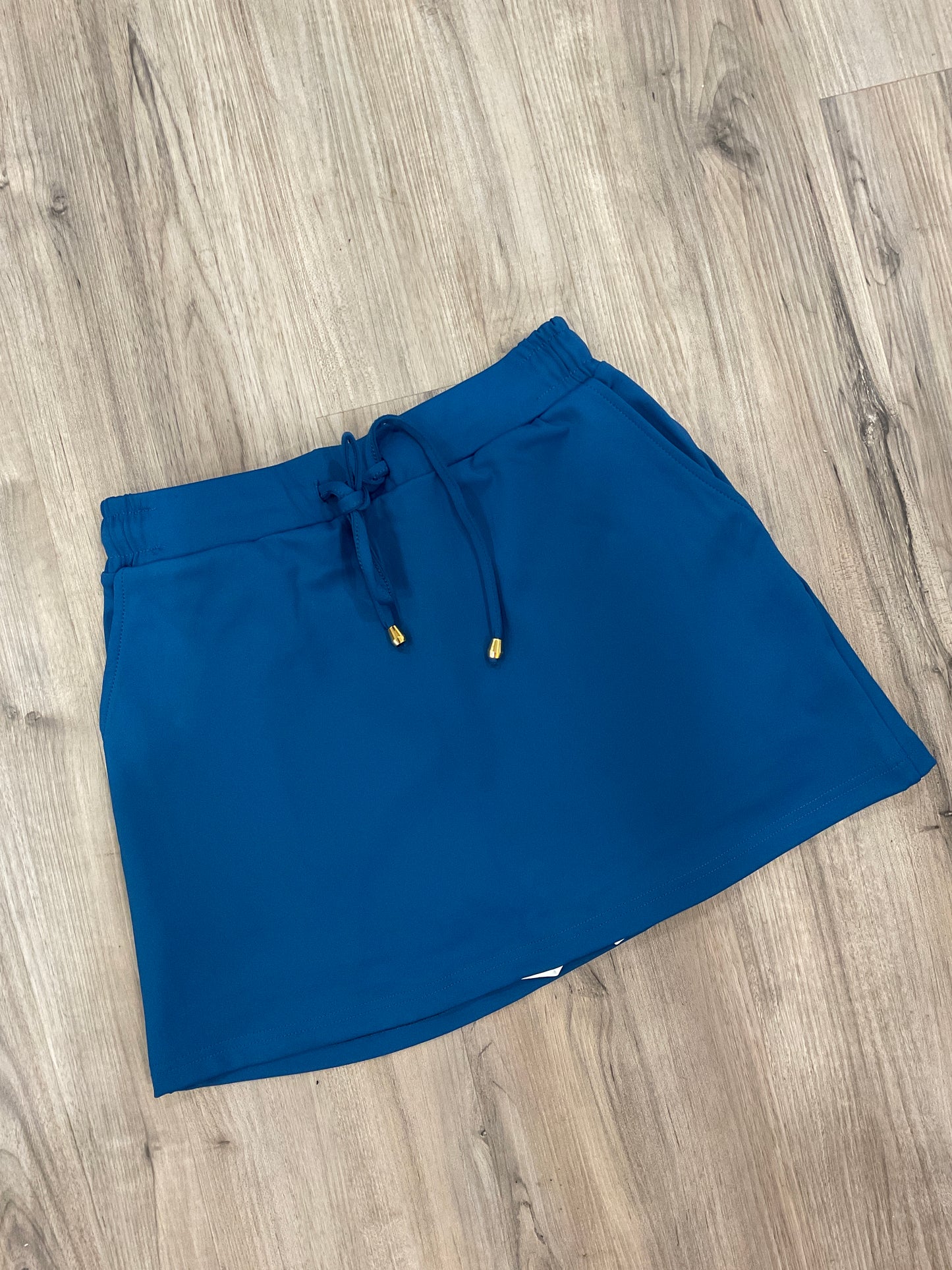 Solid teal skort